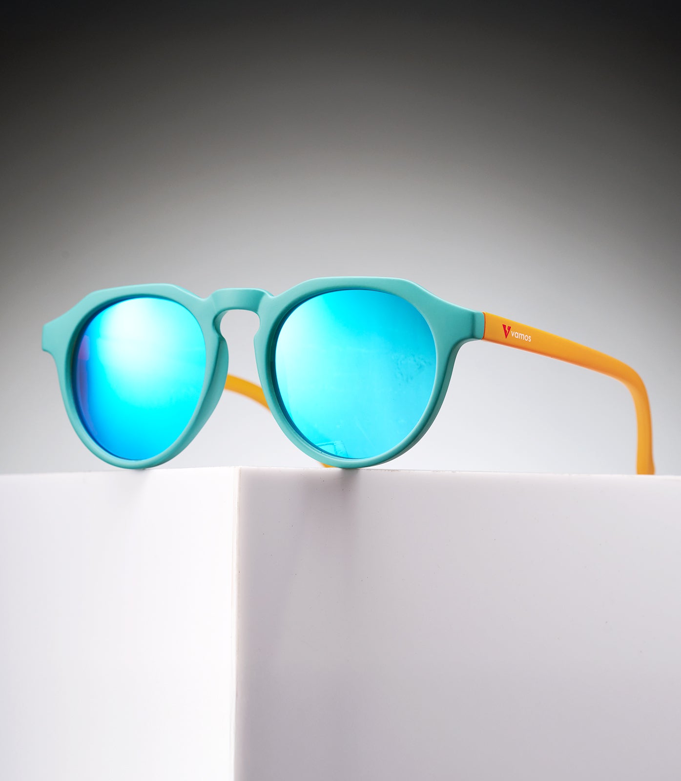 CORINZIO MATTE TEEL/YELLOW ORANGE - LIGHT BLUE LENS