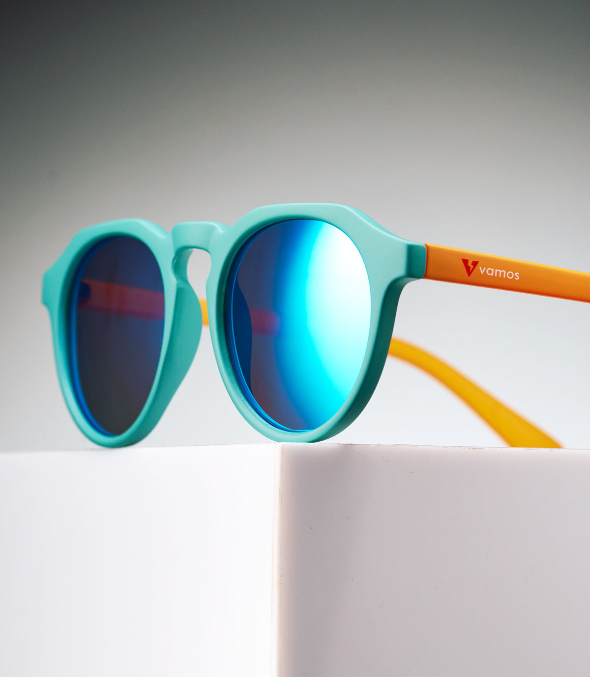 CORINZIO MATTE TEEL/YELLOW ORANGE - LIGHT BLUE LENS